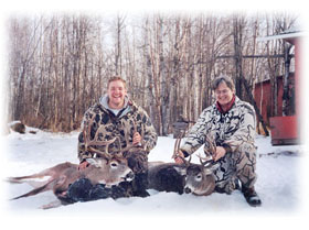 Pair of successful deer hunters