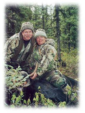 Photo of two moose hunters in camo 