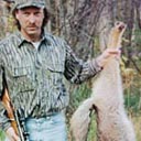 Hunter with Coyote